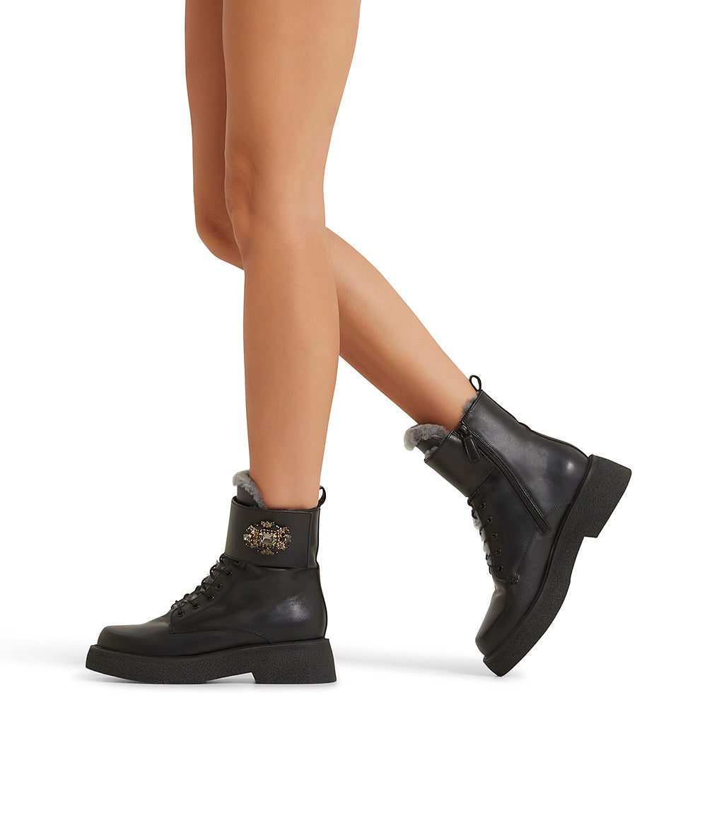 Jewel-buckle black leather lined ankle boots