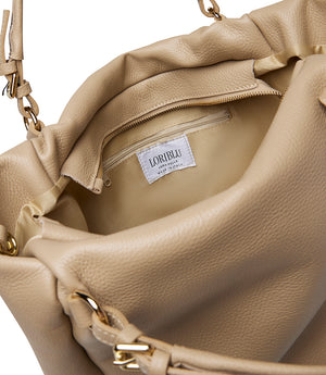 Borsa beige in pelle martellata