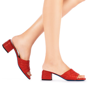 Coral red quilted nappa leather mules